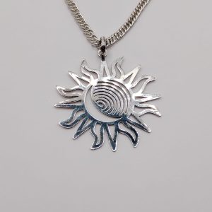 Dije de Sol y Luna